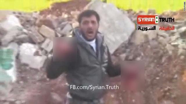 “آكل قلب” الجندي بسوريا “أبو صقر”: السبب فيديو رأيته بهاتفه !
