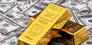 الذهب يتراجع أمام الدولار