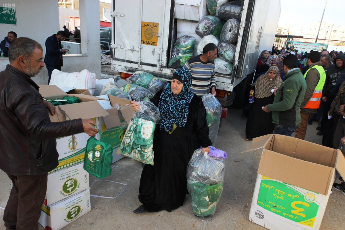 بالصور.. الحملة الوطنية توزع مساعدات إغاثية على 5562 سورياً بالأردن